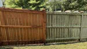 Wooden privacy fence after pressure washing